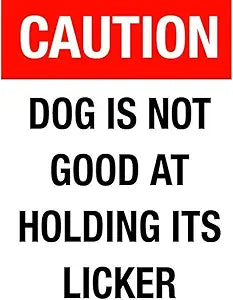 Dog holding licker Magnet